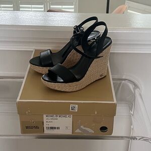 Michael Kors black wedge sandal. Great condition. Size 7.